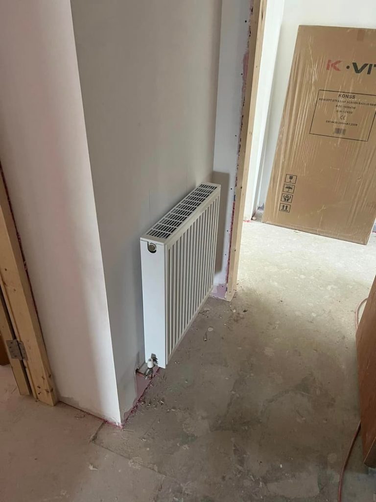 New radiator installed in hallway